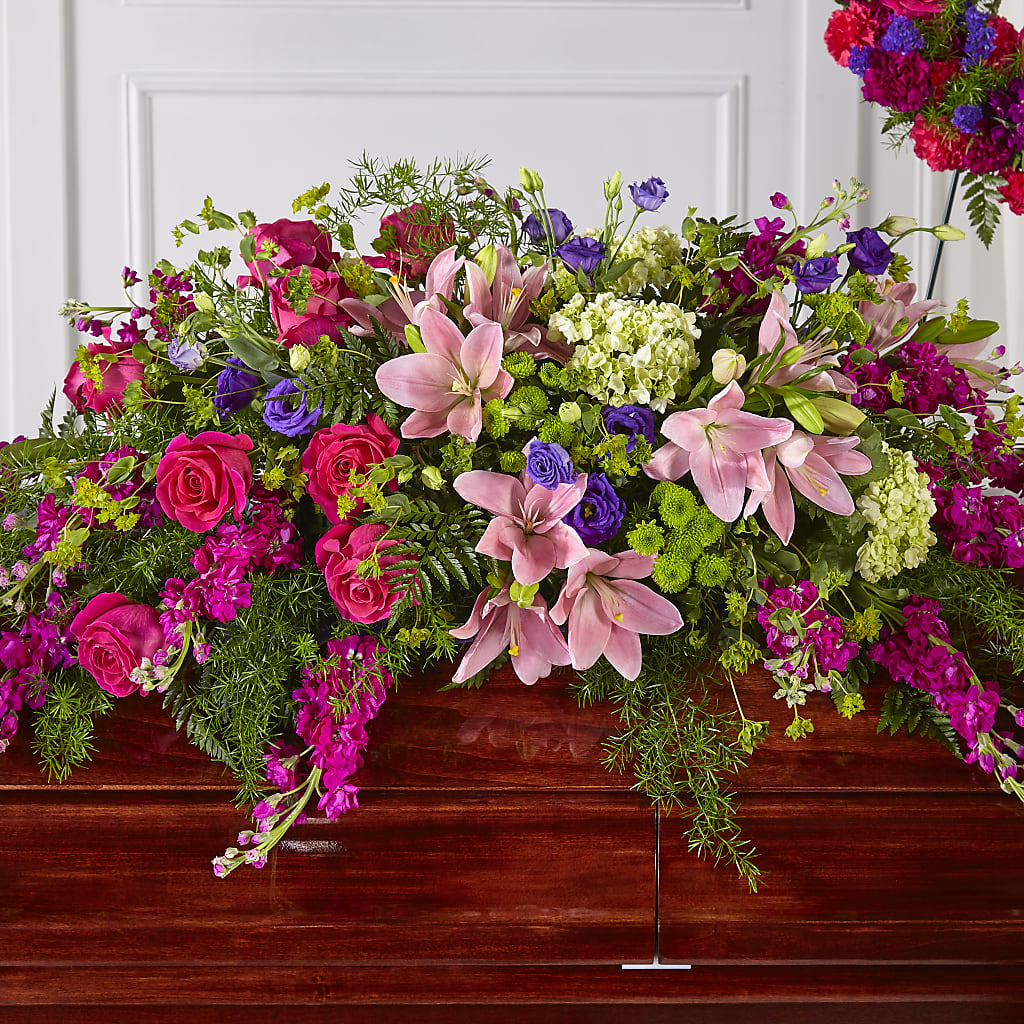 Radiant Tribute Casket Spray – BUSSE AND RIECK FLOWERS PLANTS & GIFTS, Kankakee IL