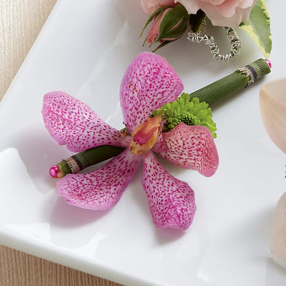 Pink Mokara Boutonniere – BUSSE AND RIECK FLOWERS PLANTS & GIFTS, Kankakee IL