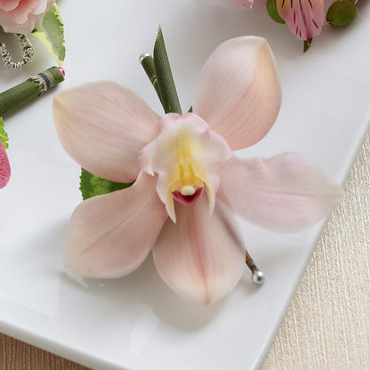 Pink Cymbidium Boutonniere – BUSSE AND RIECK FLOWERS PLANTS & GIFTS, Kankakee IL